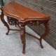 Carved wooden console