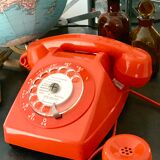 Old orange vintage dial phone