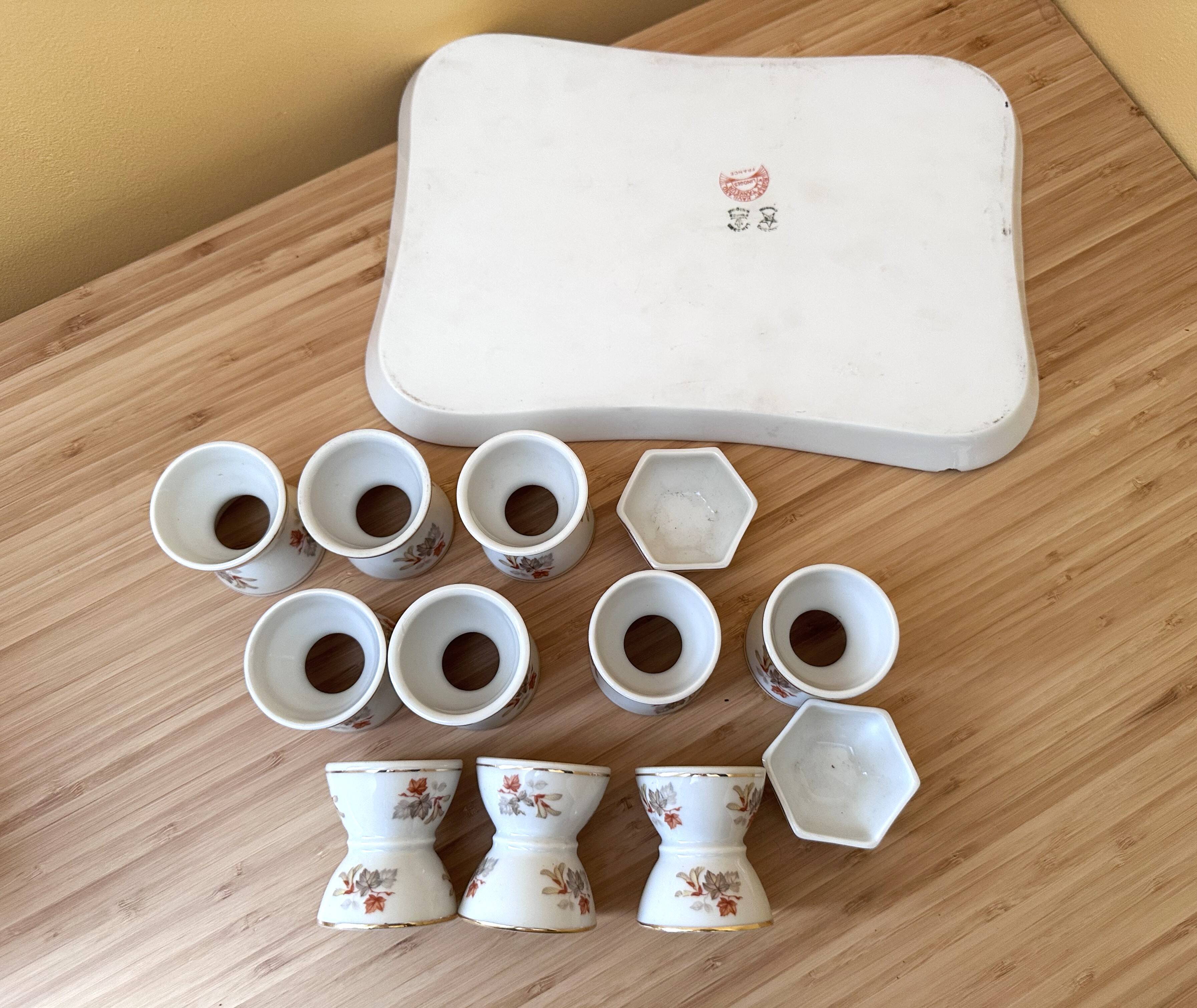 10 devil's egg cups and 2 porcelain salt cellars by Haviland and Le Tanneur 1920