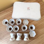 10 devil's egg cups and 2 porcelain salt cellars by Haviland and Le Tanneur 1920