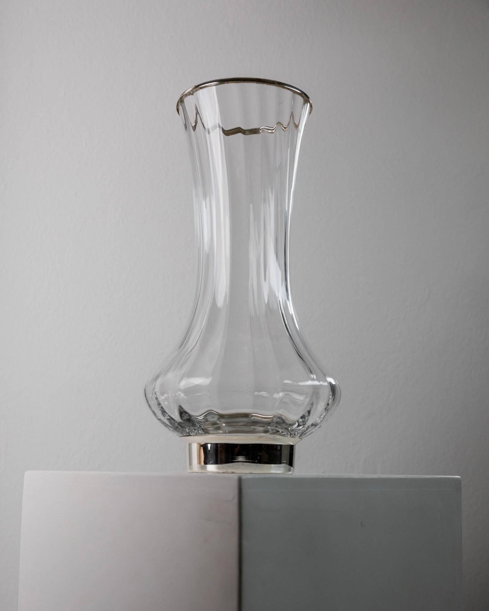 Vintage glass vase from the 1980s, transparent glass with fine linear pattern and silver metal details, elegant sculptural flower vase, gift idea.