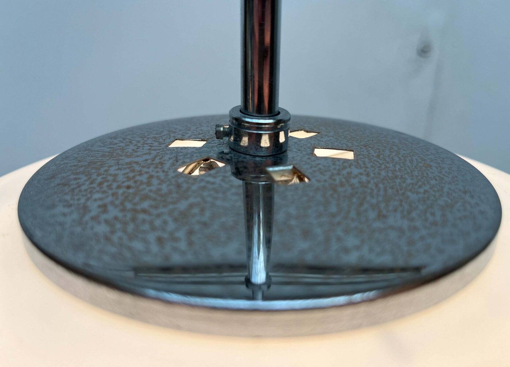 Minimalist suspended glass ball lamp from the vintage German space age by Glashütte Limburg, 1970s.