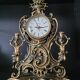 Louis XV style gilded bronze clock