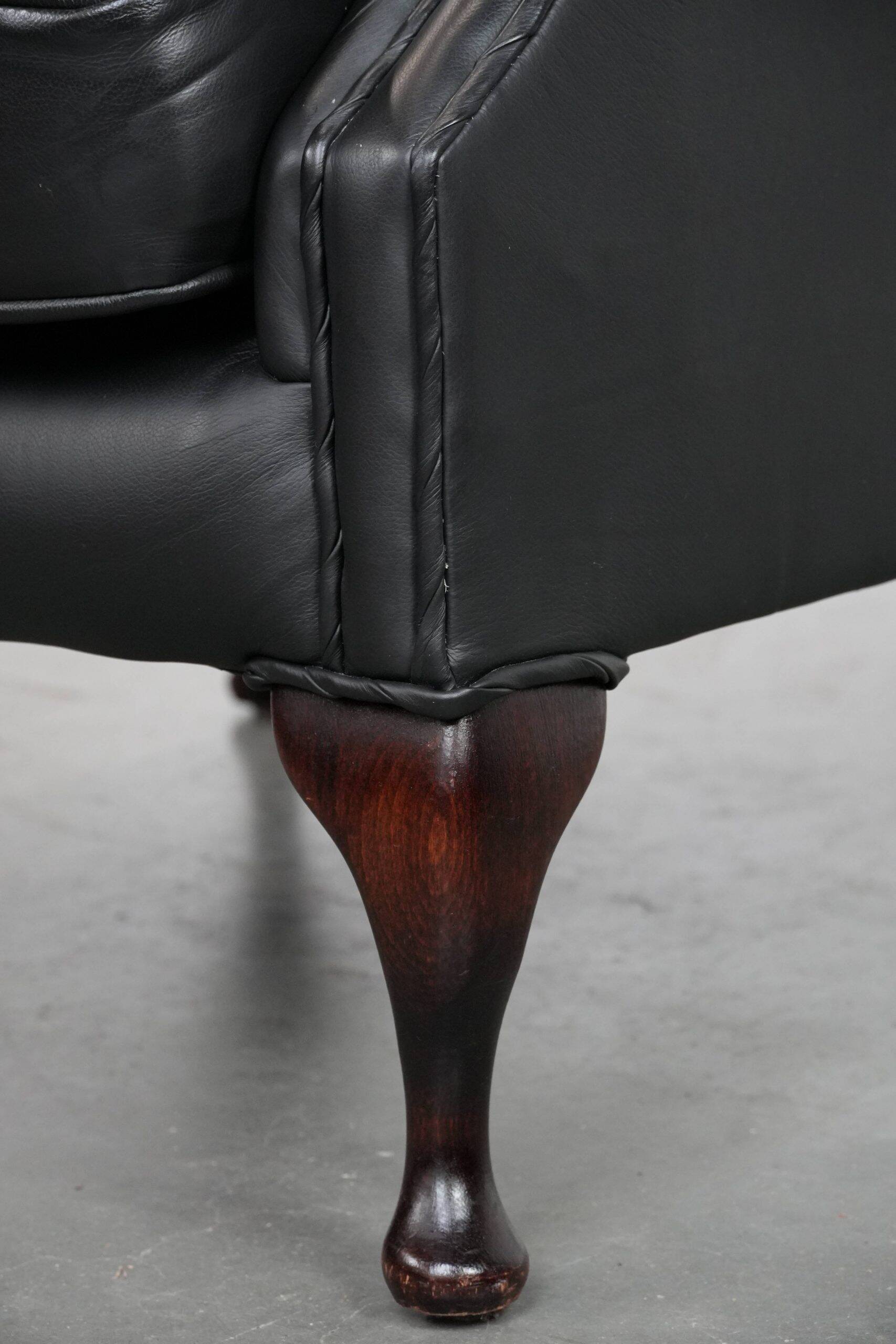 Black cowhide leather Chesterfield wingback chair in English style