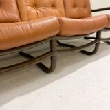 Mid-century modern rattan and cognac leather sofa
