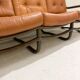 Mid-century modern rattan and cognac leather sofa