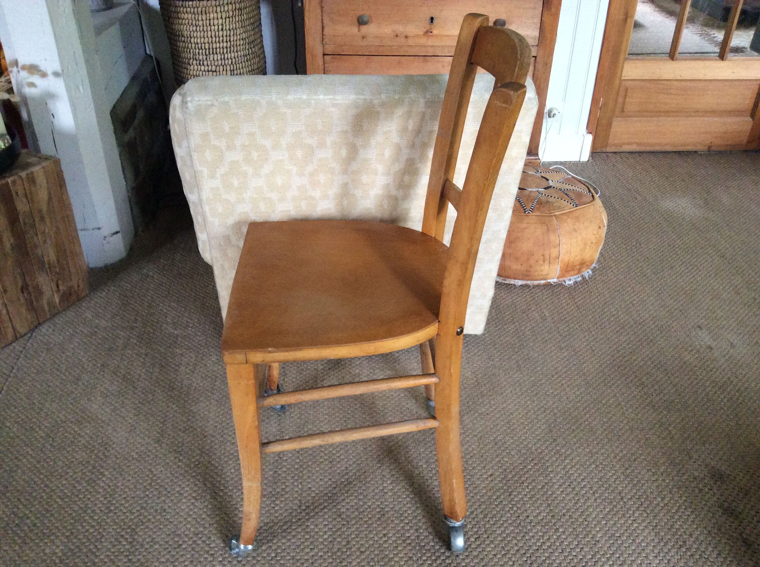 Wooden chair with wheels