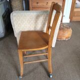 Wooden chair with wheels