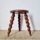 Modernist farm stool with screw legs