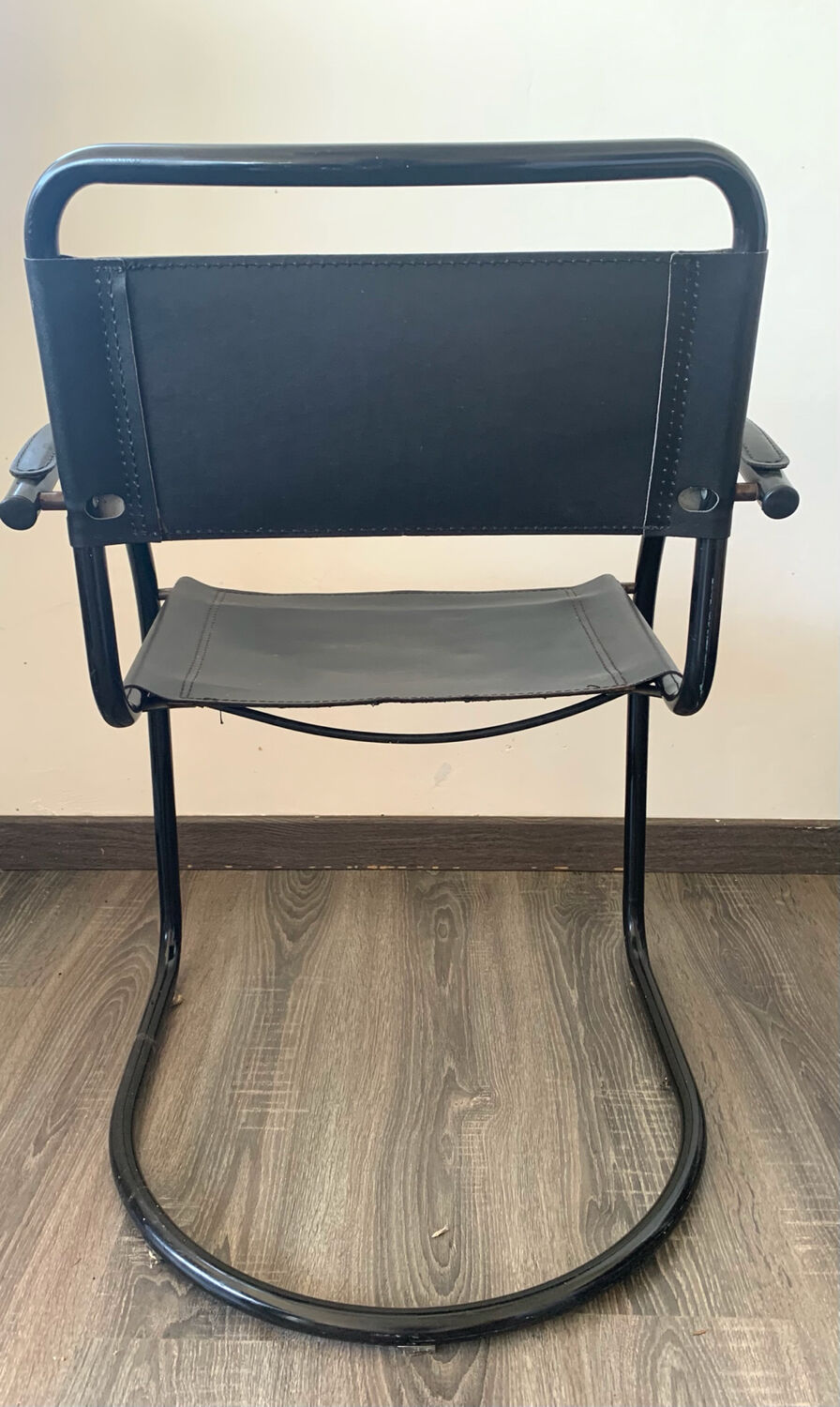 Vintage black sleigh armchair