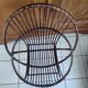 Rattan and metal shell armchair
