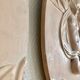 Pair of putti medallions