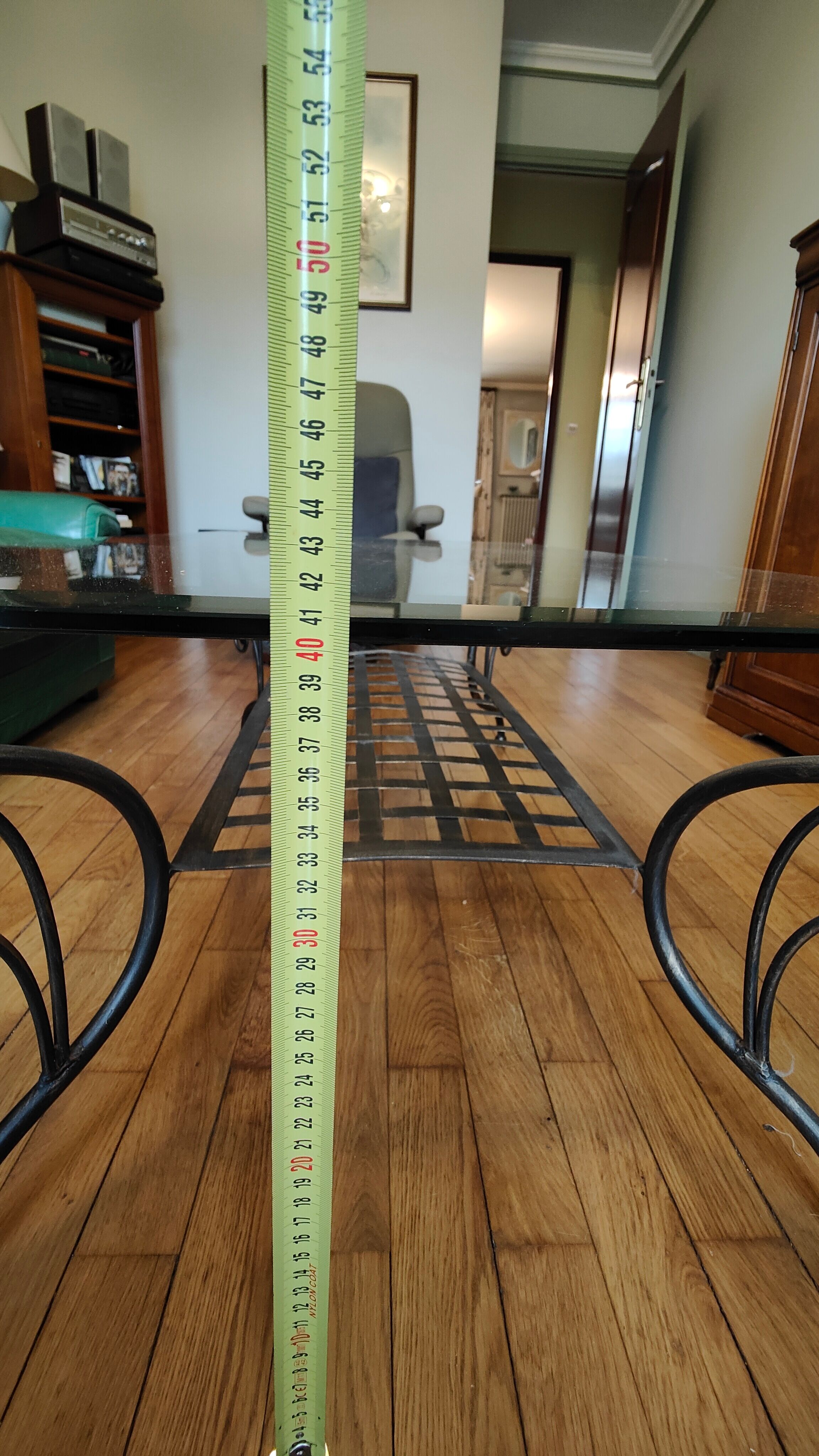 Black wrought iron coffee table and Roche Bobois glass top