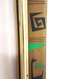 Mirror with a graphic decoration