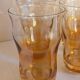 Four iridescent honey blown glass glasses