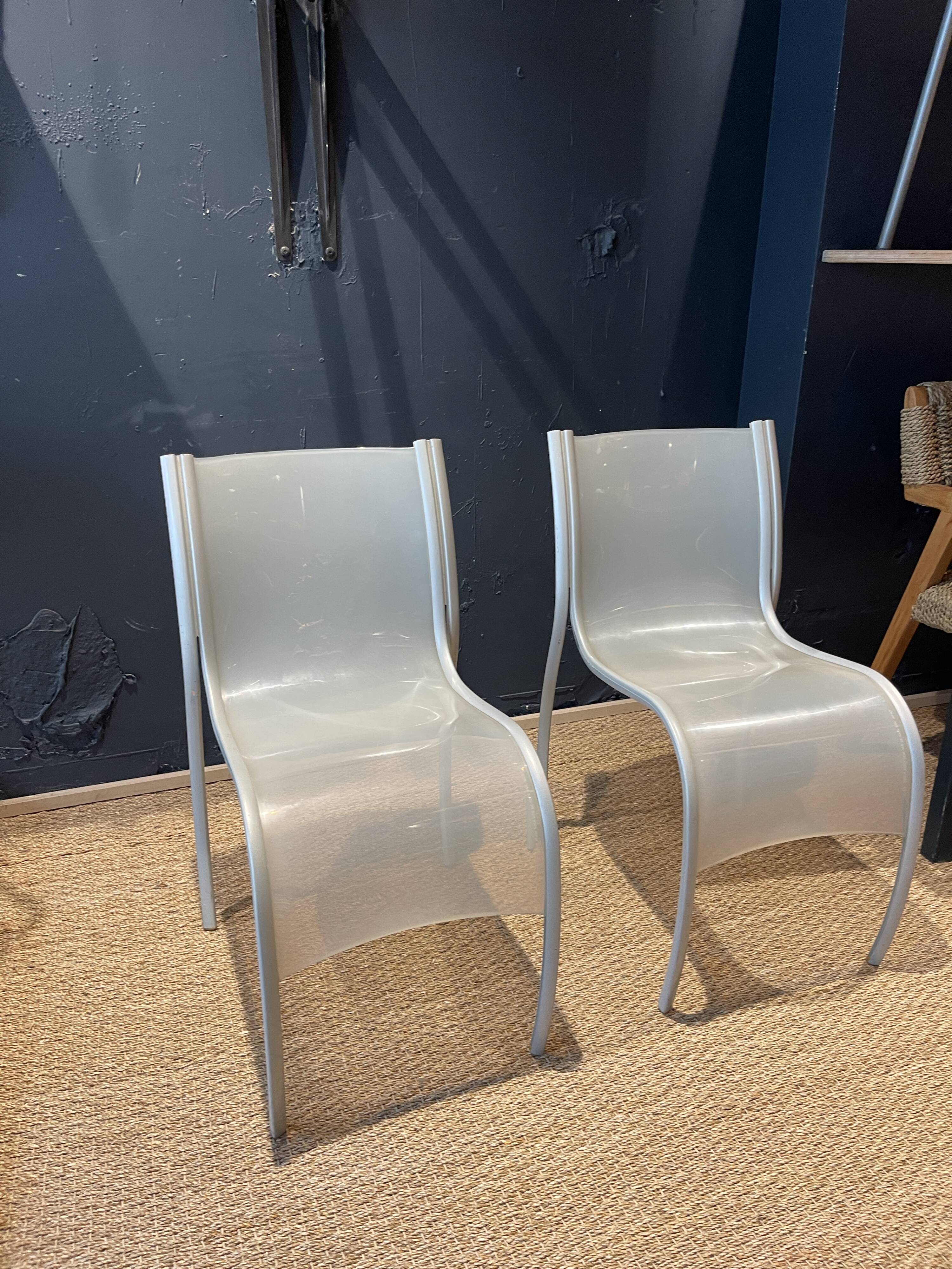 Pair of fpe chairs by ron arad for kartell translucent gray italy