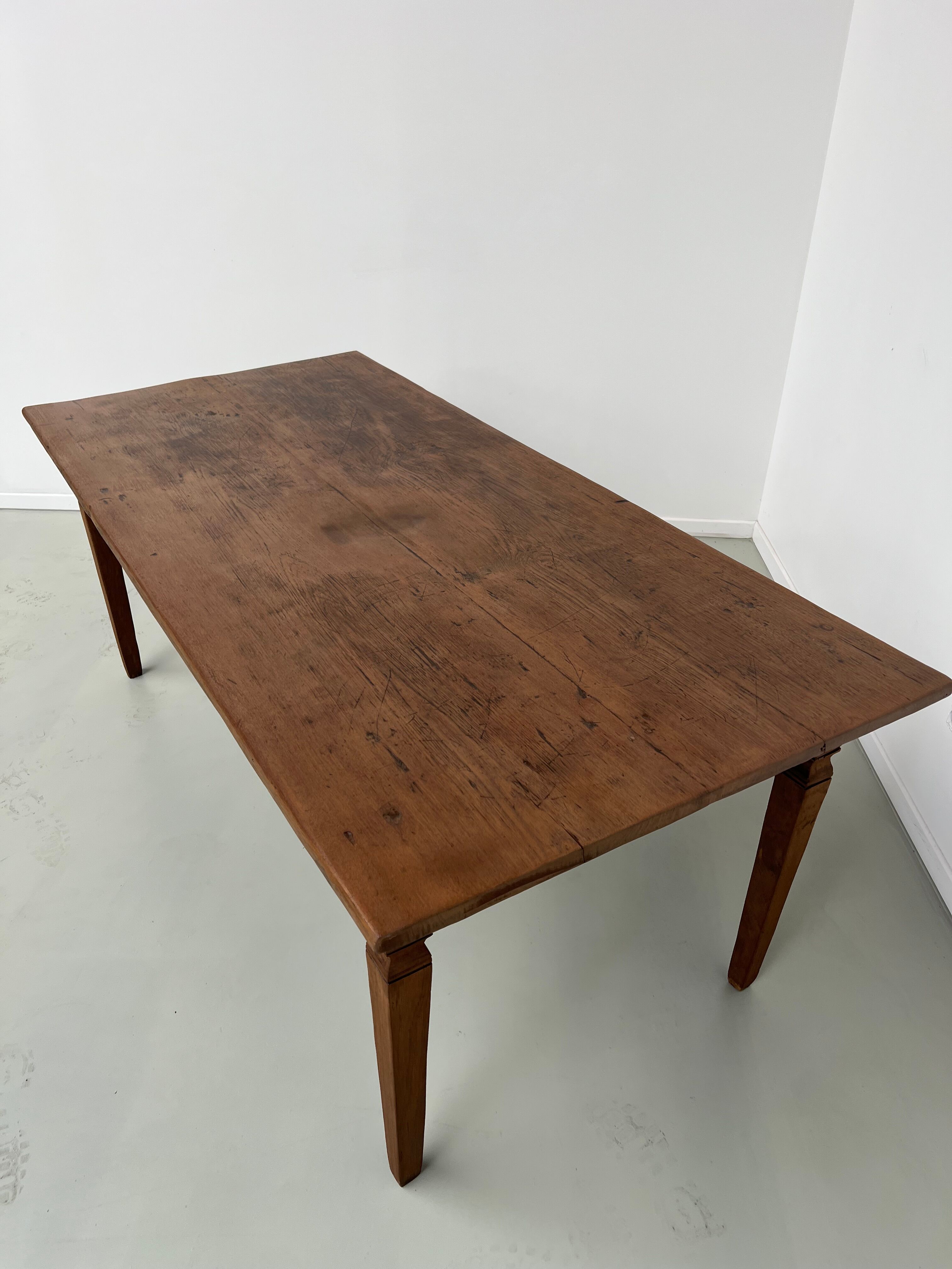 Teak dining table with spindle legs, 50s