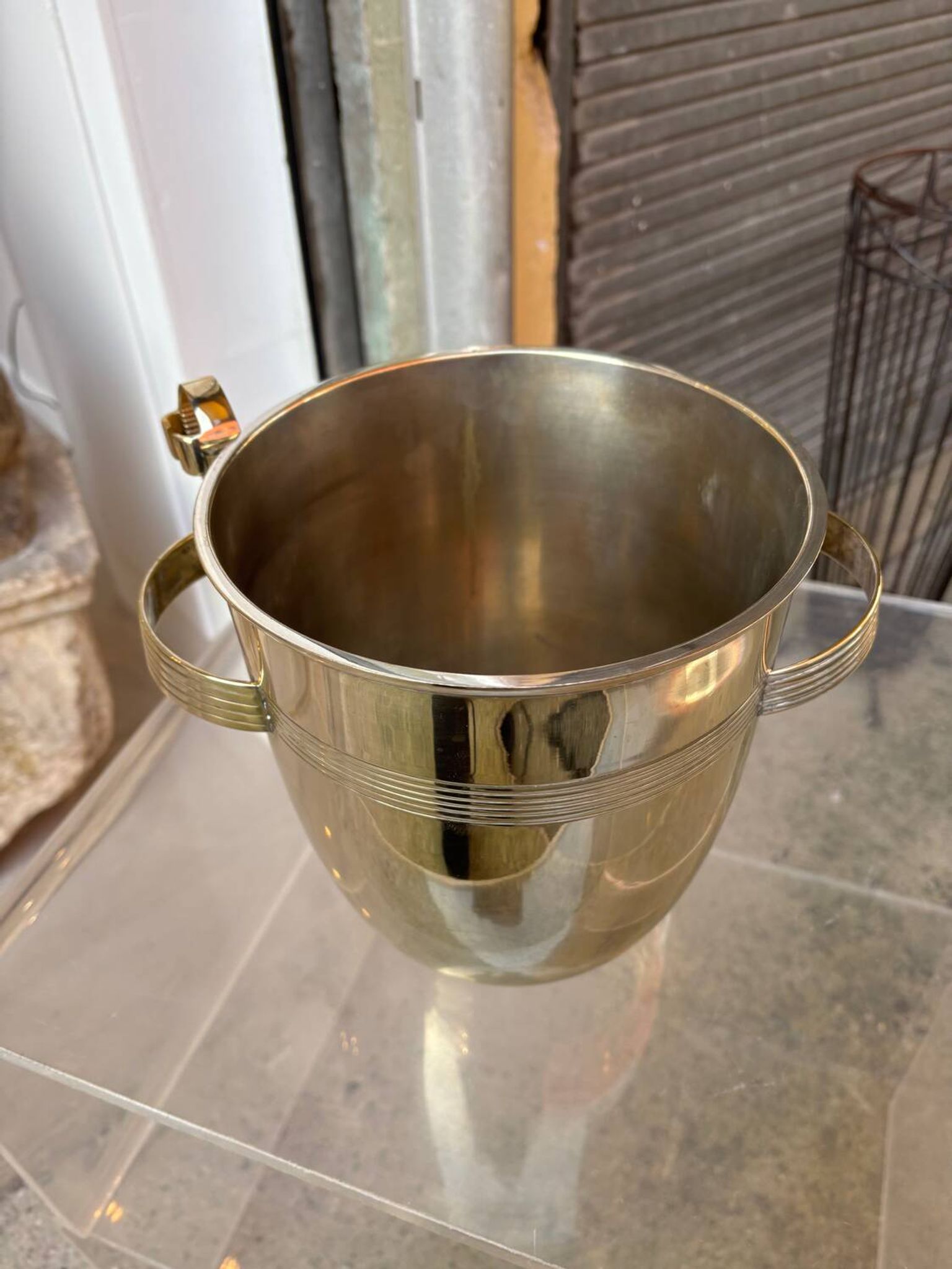 Alpaca champagne bucket from the 1920s with its monopole tongs.