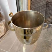 Alpaca champagne bucket from the 1920s with its monopole tongs.
