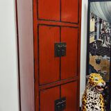 Red Chinese cabinet with three doors