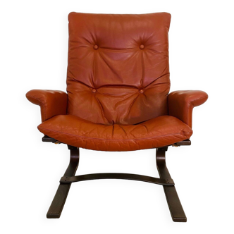 Vintage scandinavian cognac lounge chair by komfort