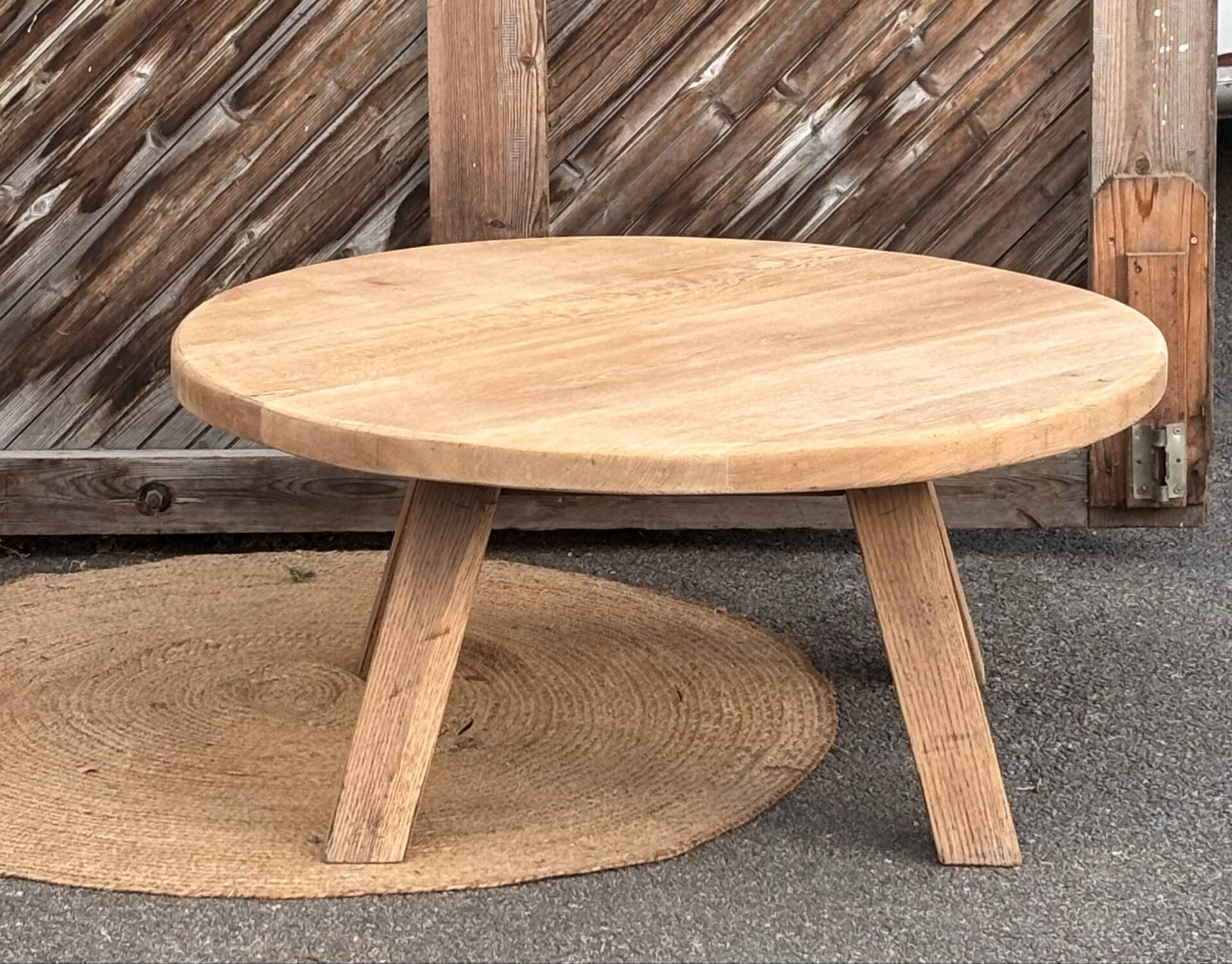 Antique round coffee table in raw solid oak.