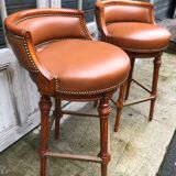 Pair of bar stools turning bar rests brass feet Hollywood Regency