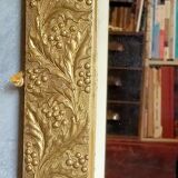 Miroir art-déco or au décor végétal 52x31cm