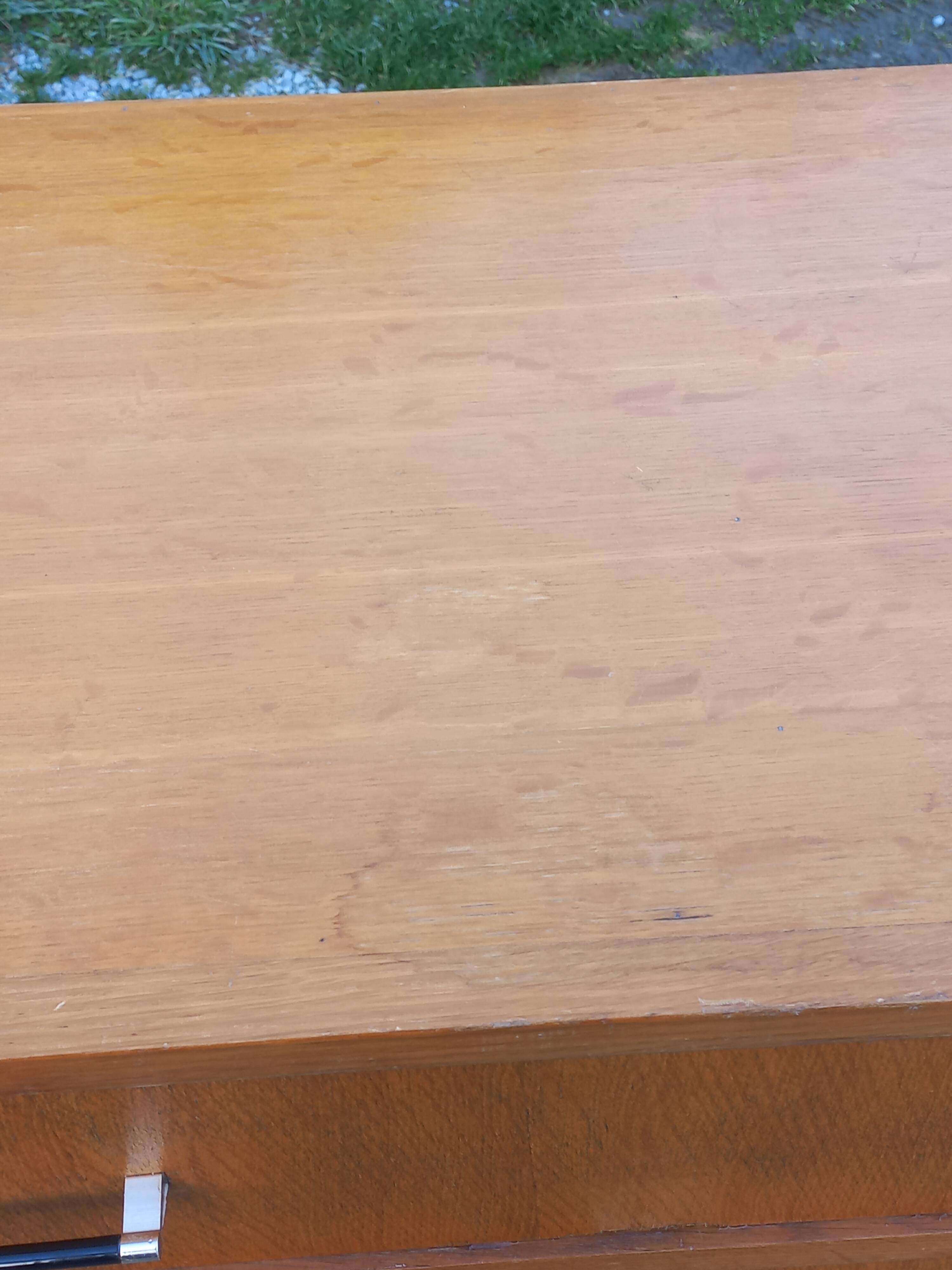 Vintage oak commode with tapered legs and wings from the 1950s.