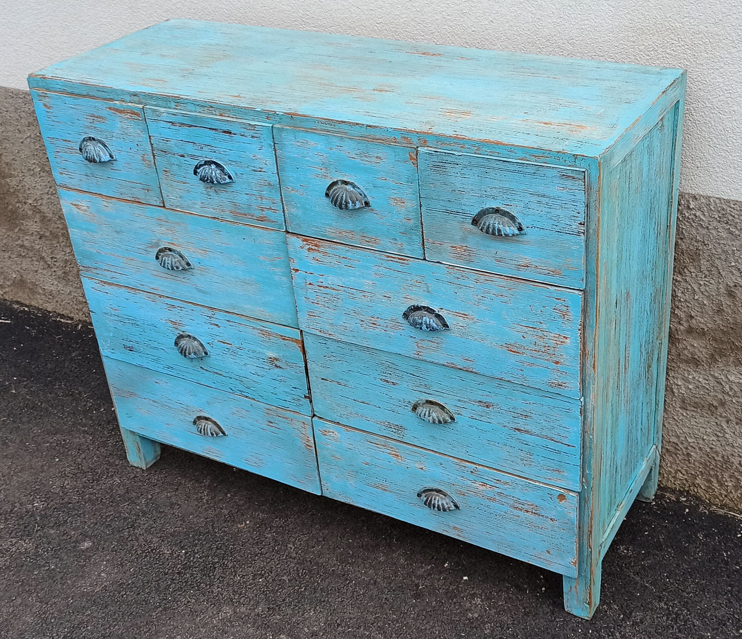 Blue wooden dresser with drawers
