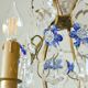 Antique French chandelier cage in gilded bronze and crystal, with blue pendants.