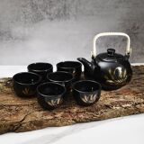 Japanese tea service, teapot and 6 cups, black, gold pattern.