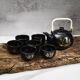Japanese tea service, teapot and 6 cups, black, gold pattern.