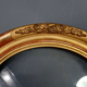 Oval frame nineteenth century gilded stucco wood and glass 36x31 foliage 28x23 cm