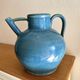 Old oriole in speckled blue glazed stoneware, south-west.
