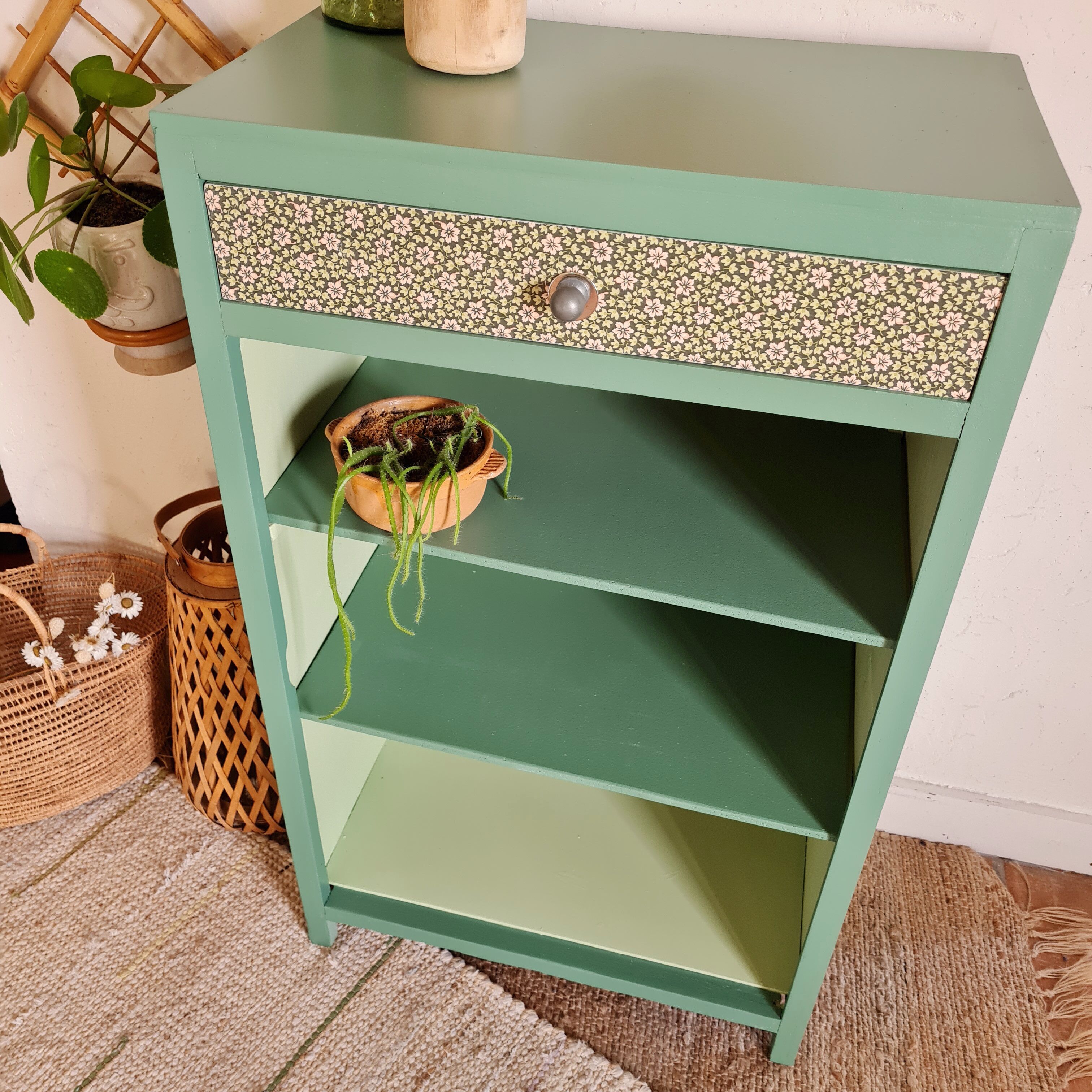 Renovated library shelf green color and floral atmosphere