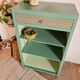 Renovated library shelf green color and floral atmosphere