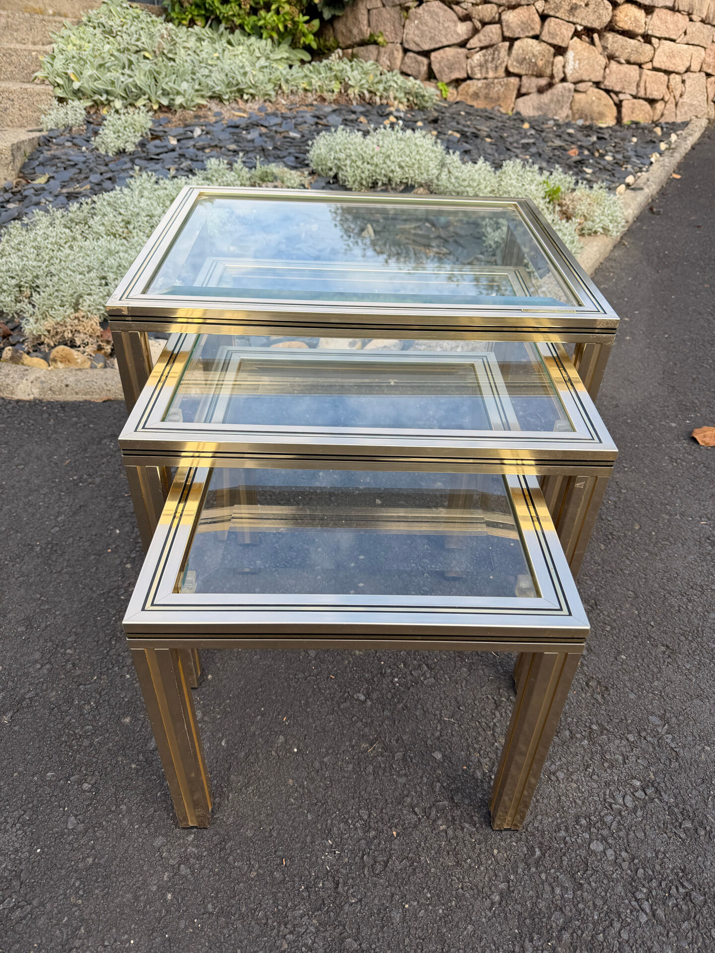 Nested tables by Pierre Vandel Paris in gilded metal and glass, 1970s.