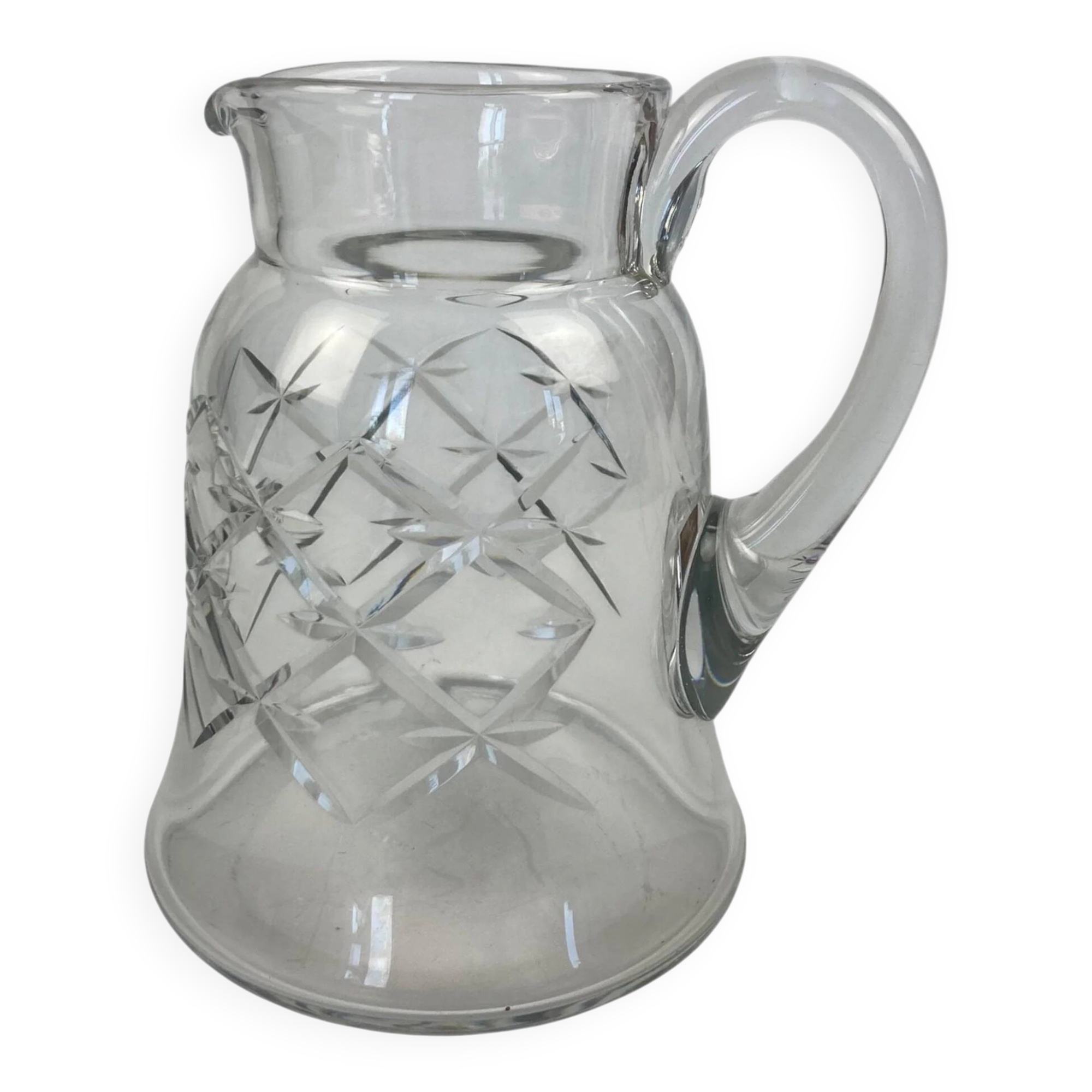 Antique Baccarat water jug in cut crystal with bevels.