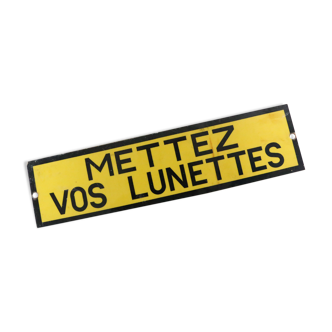 Warning industrial plate "put your glasses"