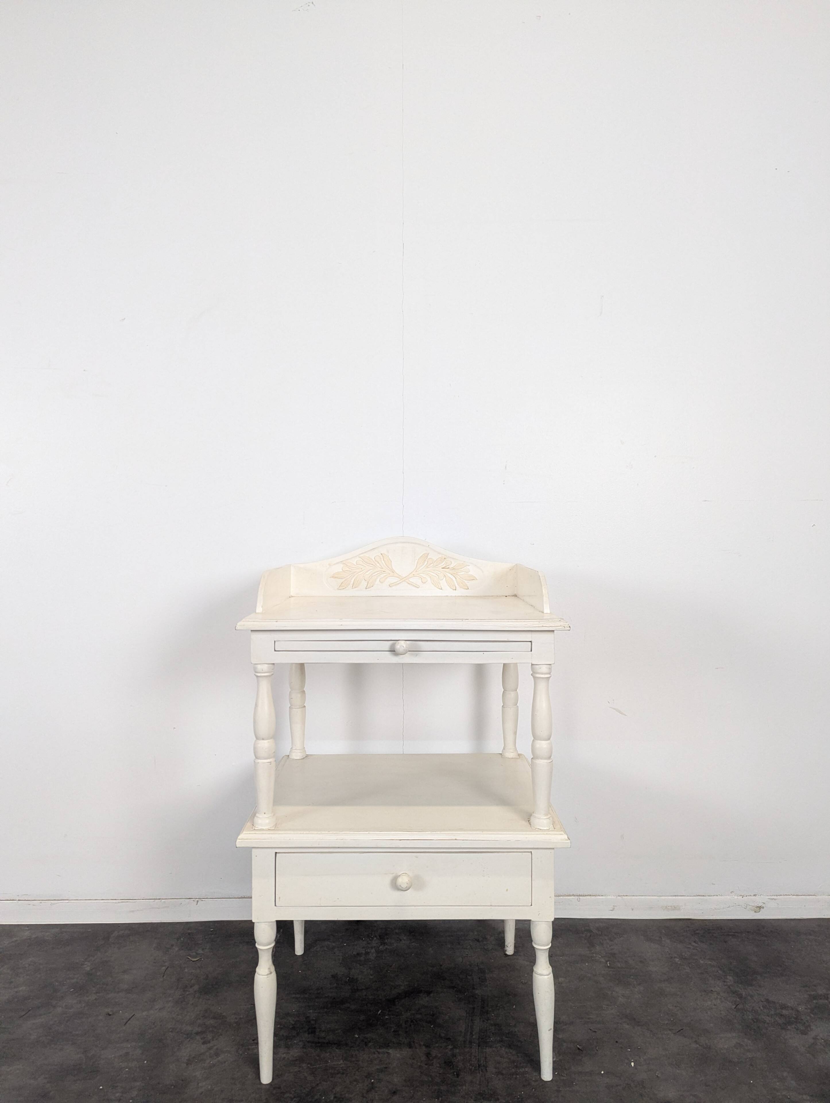 White side table with a painted finish.