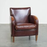 Subtle sheep leather armchair with a beautiful finish and a good patina