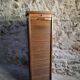 French antique wardrobe with curtain in oak, circa 1920–1930.