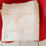 White sheet: reverse with embroidery and handmade stitching.