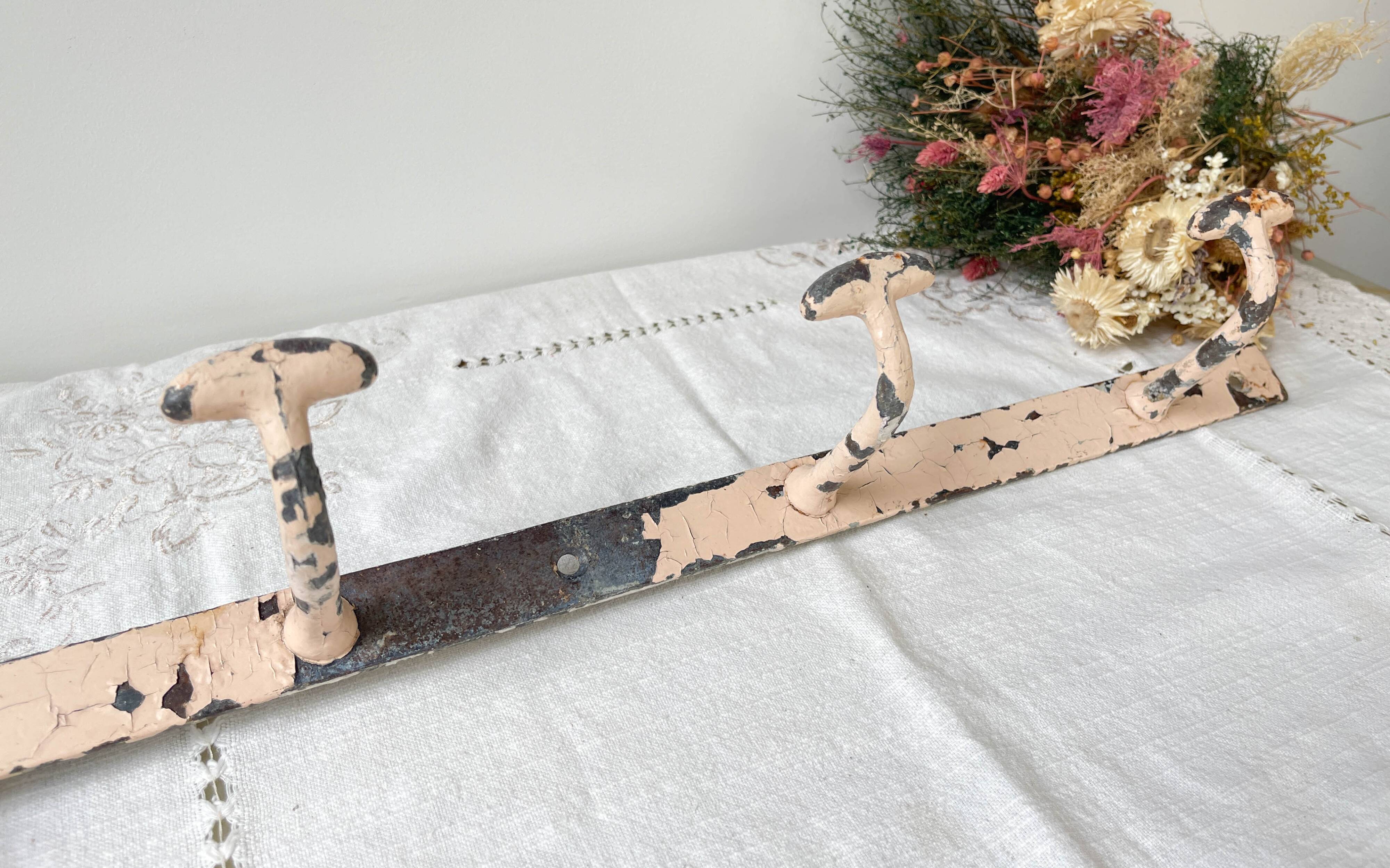 Vintage enameled cast iron wall hook with 3 hooks