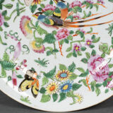 Porcelain plate of Canton XIXth decoration of butterflies and bird