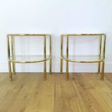 Pairs of gilded metal bedside tables and glass tops