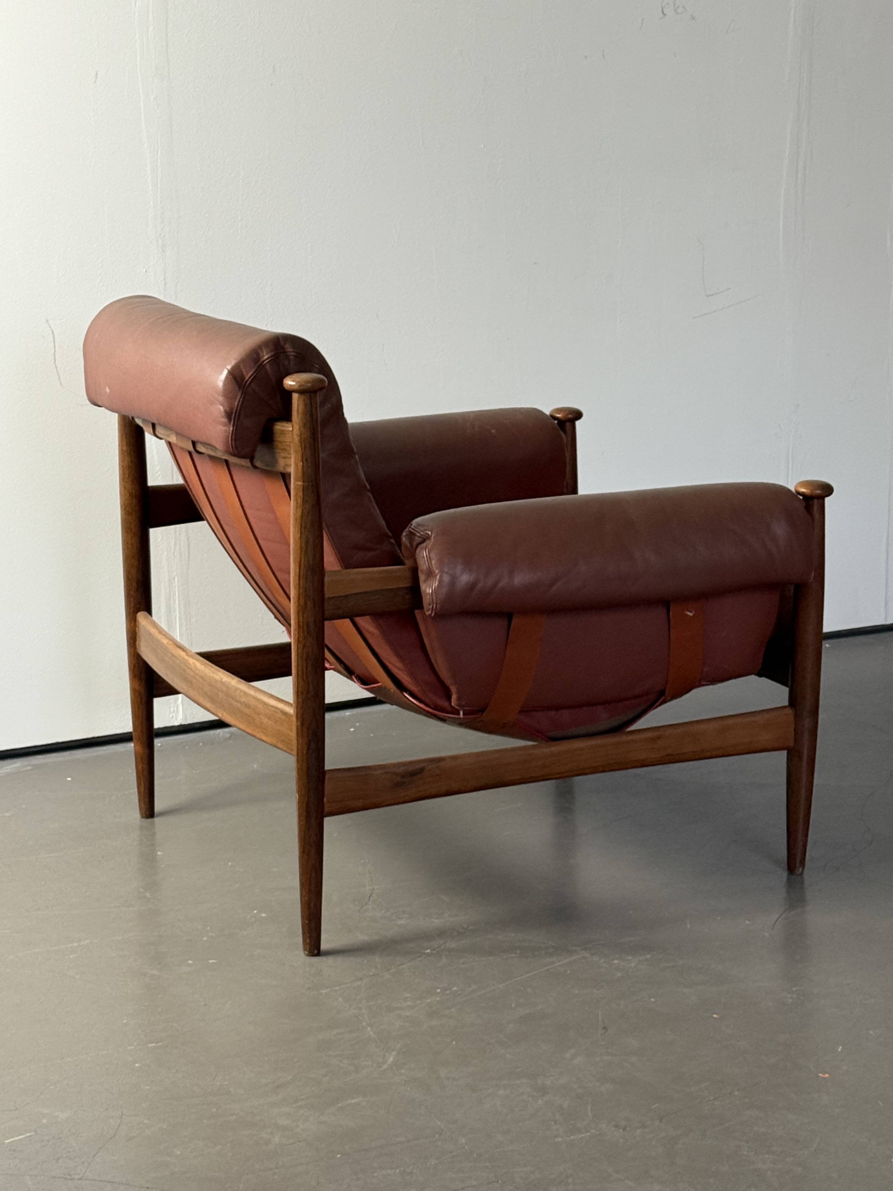 Admiral armchair by Eric Merthen, in leather and rosewood