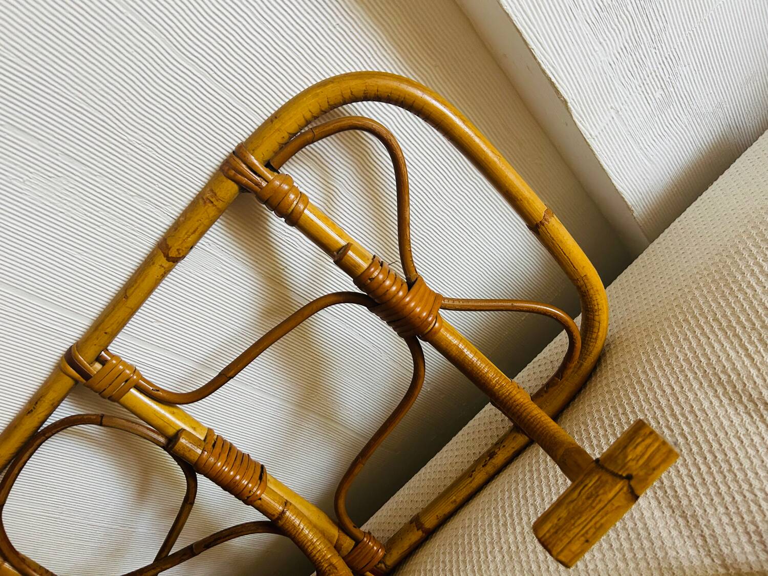 Vintage rattan wall-mounted coat rack