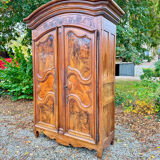 Large gendarme hat cabinet in walnut from the louis period
